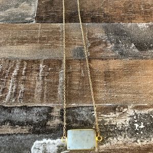 Gold necklace w/marbled pendant